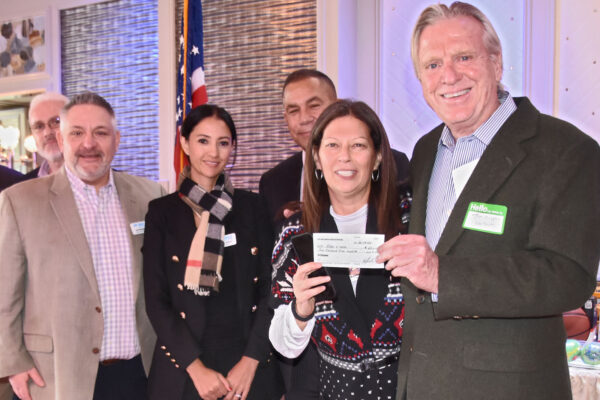 Members of the JFK Cirgo Assn. Board presenting a check, co-funded with the Airport Community Foundation, to the Edge4Vets program administered by Tom Murphy.